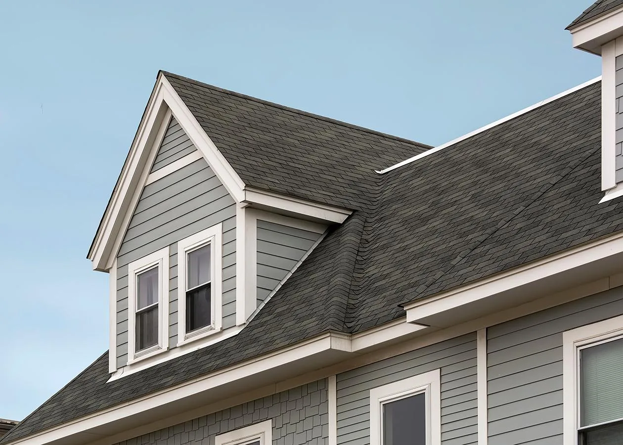 Clean shingle roof on a coastal-style home